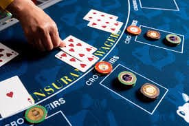 coinqq platform dashboard showing football markets, live-dealer tables, and slot games